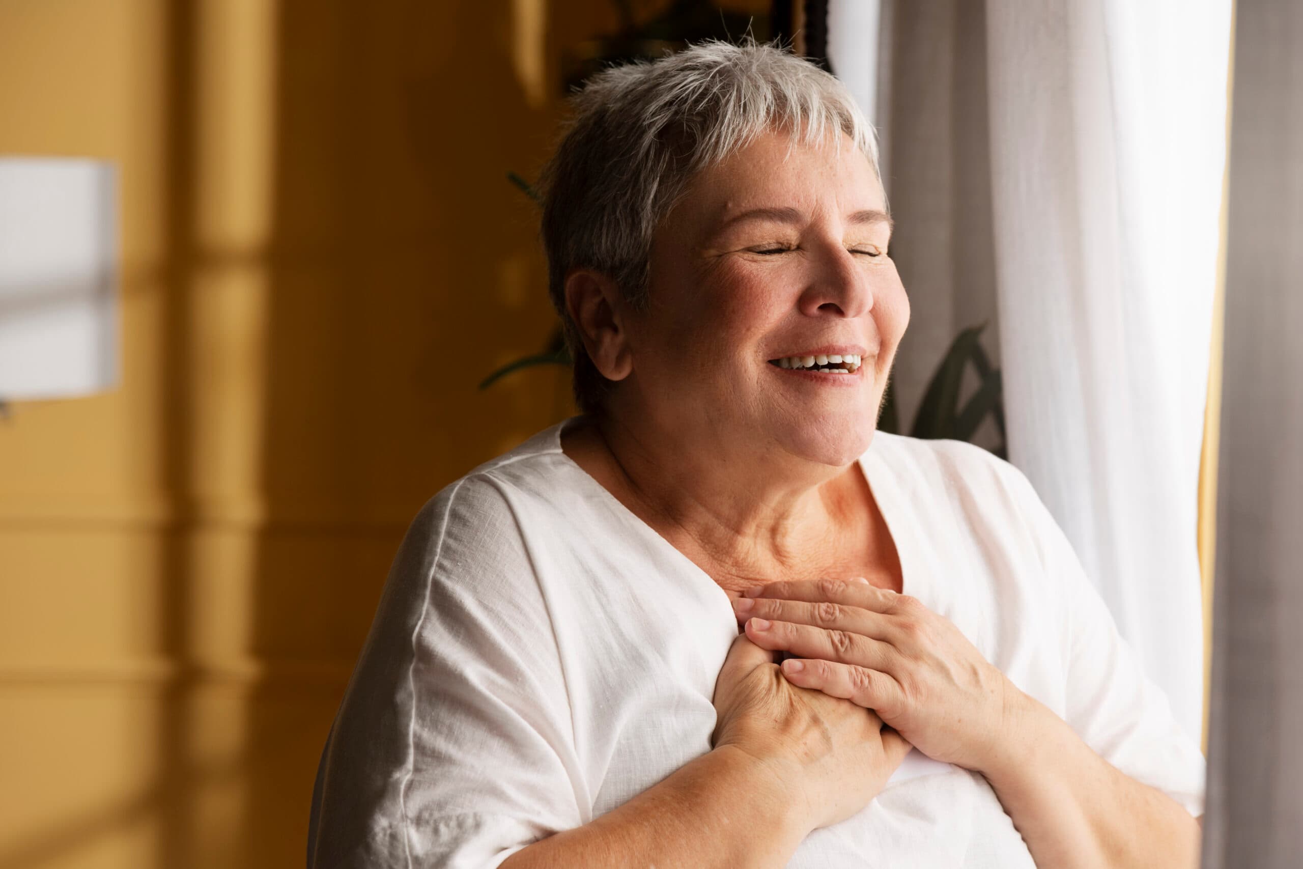 A woman smiling at home